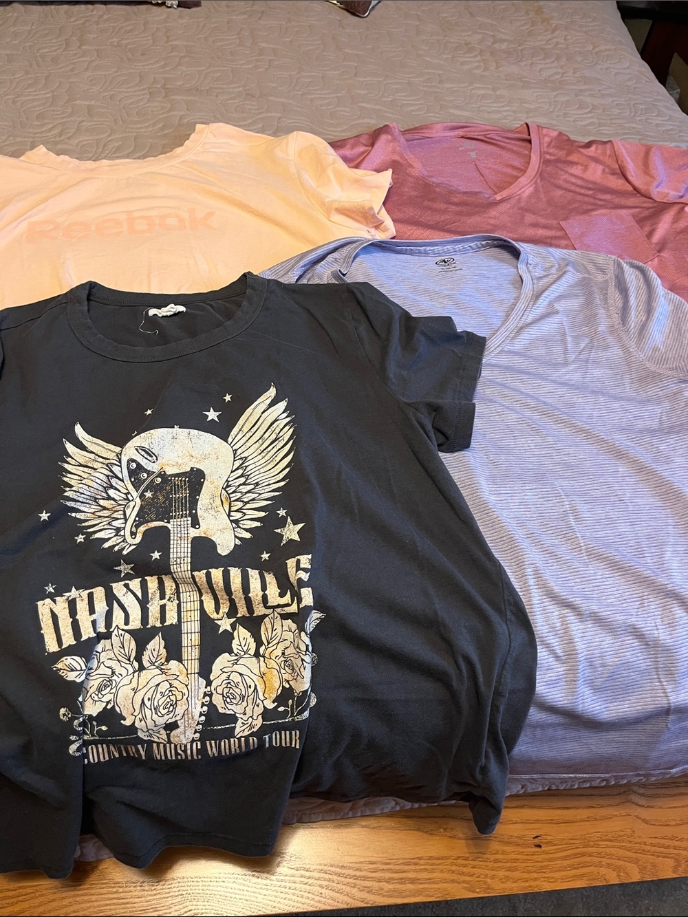 Four XL ladies T shirts. Various brands